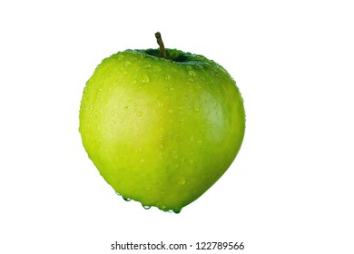 The ripe green apple covered by water drops isolated on white