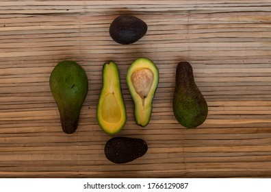 Ripe Green Avocado, Lie On A Reed Mat. View From Above. Harvest Concept.