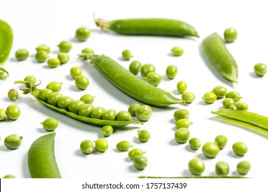 Ripe green peas on a white background, after assembly on the farm