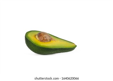 ripe half avocado with ossicle isolated on white background