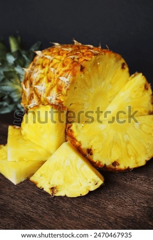 Similar – Image, Stock Photo Cut Pineapple Head on a Cork Background