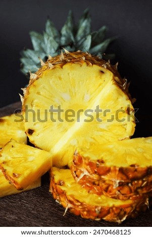 Similar – Image, Stock Photo Cut Pineapple Head on a Cork Background