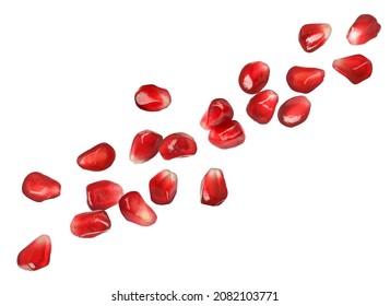 Ripe Juicy Pomegranate Seeds Falling On White Background