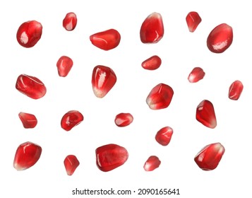 Ripe Juicy Pomegranate Seeds Falling On White Background 