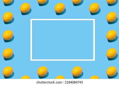 Ripe Lemons And Empty Paper Frame On Blue Background - Creative Summer Mockup