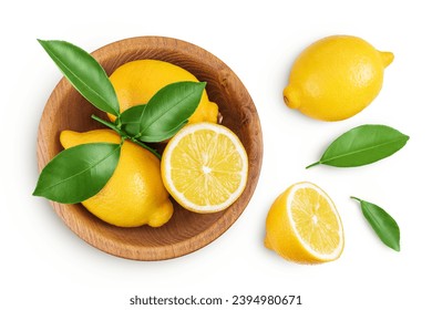 Ripe lemons in wooden bowl isolated on white background. Top view. Flat lay. - Powered by Shutterstock