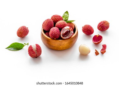 Ripe lychee. Exotic asian fruits in bowl on white desk
