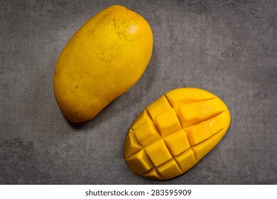 Ripe Mango Sliced Overhead View On Beautiful Grey Background