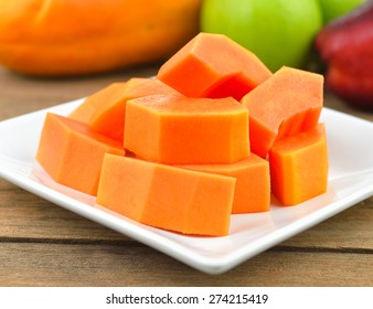 Ripe Papaya Sliced  On  White Plate