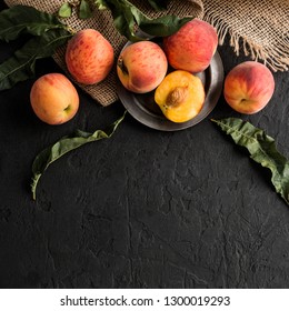 Ripe Peaches On Black Stone Background. Healthy Food Concept, Top View, Copy Space