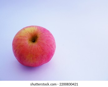 A Ripe, Pink Apple Looks Attractive To Quench Thirst