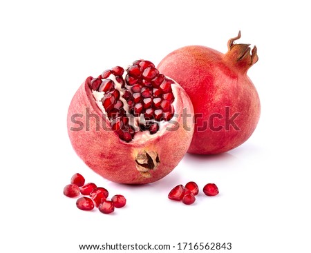 Ripe pomegranate  on white background closeup. Imagine de stoc © 