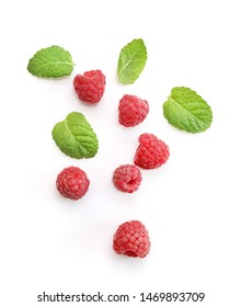 Ripe Rasberries And Mint Isolated On White Background. Top View