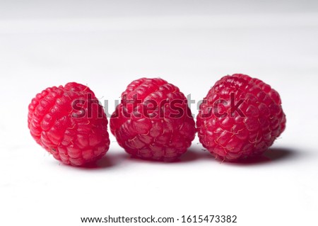 Similar – Frische Himbeeren auf gelbem Hintergrund