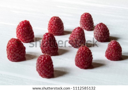 Similar – Frische Himbeeren auf gelbem Hintergrund