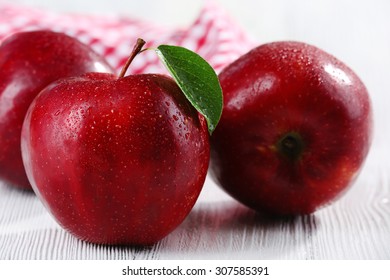 Ripe Red Apples On Table Close Up