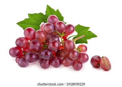 Ripe red grape. Pink bunch with leaves isolated on white. With clipping path.