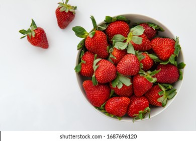 Ripe Red Strawberries On White Bowl, Over White Background