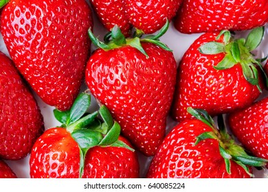 Ripe red strawberry, background - Shutterstock ID 640085224