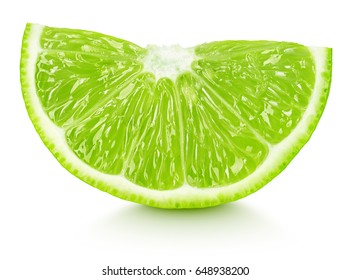 Ripe slice of green lime citrus fruit isolated on white background