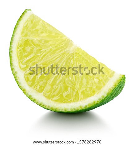Ripe slice of lime citrus fruit isolated on white background. Lime wedge with clipping path. Full depth of field. Stock photo © 