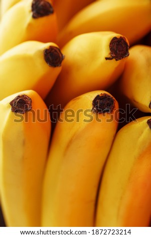 Ripe and sweet yellow bananas close up full screen