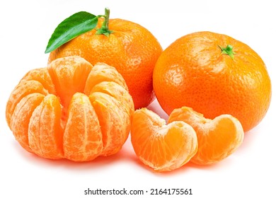 Ripe tangerine fruits with leaf and tangerine slices on white background.