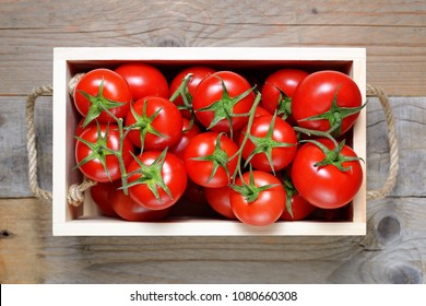 Ripe Tomatoes In Wooden Box Close-up