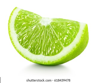 Ripe wedge of green lime citrus fruit isolated on white background. Lime slice with clipping path - Powered by Shutterstock