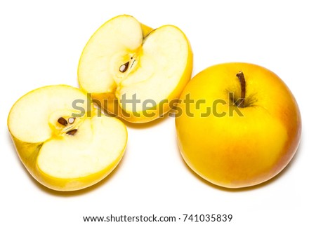 ripe yellow apple fruit and apple half isolated on white background.