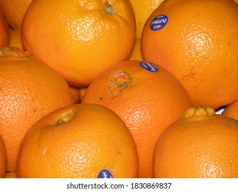 Ripened Naval Oranges At A Farm Stand. 