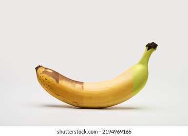 Ripening stages of a banana on a white background with a soft shadow. - Shutterstock ID 2194969165