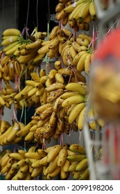 Ripped Bananas Hanging Off The Street.