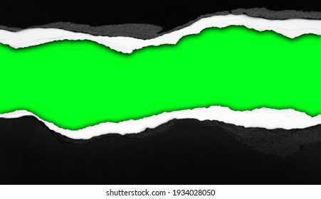 Ripped Black Paper On Green Background