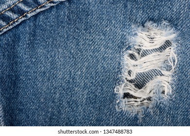 Ripped Denim Jacket (ripped Jeans) In Close Up Detail, Fabric Texture Background With Copy Space