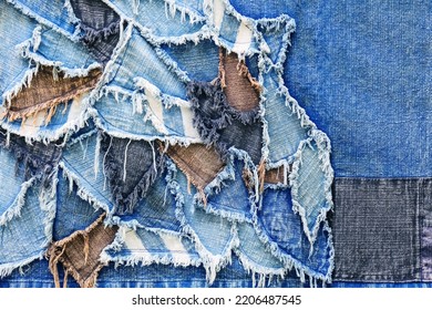 Ripped Denim Patch And Destroyed Torn Denim Blue Scraps. Double Color Denim Jeans Fashion Abstract Background