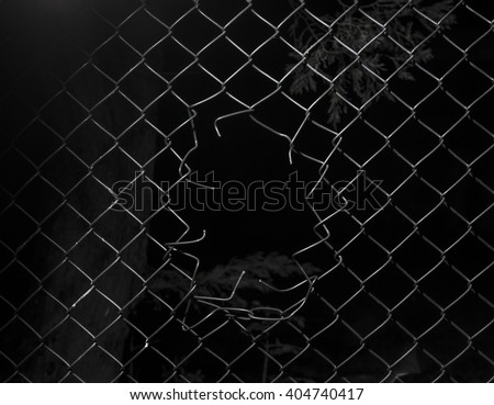 Ripped wire fence