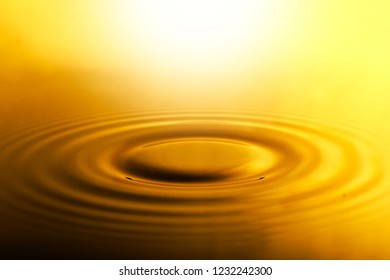 Ripple Of The Golden Surface Of The Water