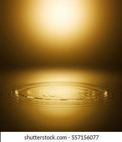 Ripple of the golden surface of the water