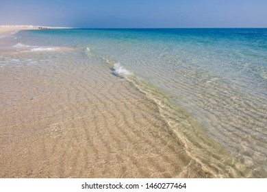 Ripples Form In The Clear Water Of The Beach Of  Sealine Beach Resort, Qatar