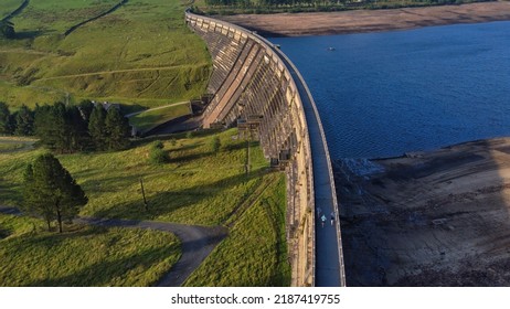 Ripponden, West Yorkshire, England, Britain, August 2022, Aerial View Of Leisure Runners Taking Exercise Across Baitings Dam And Reservoir