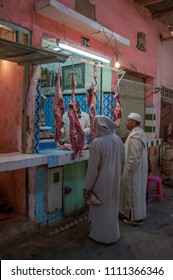 Risani, Morocco - March 20, 2012: Two Men Buying In A Butcher Shop Inside The City Market