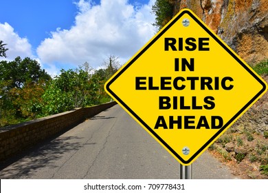 Rise In Electric Bills Ahead Yellow Warning Road Sign