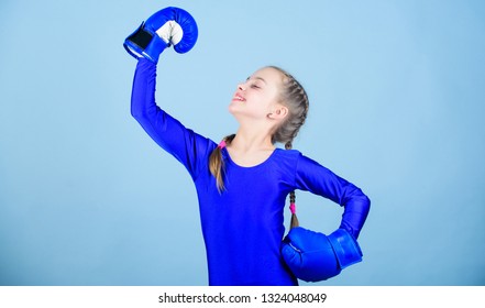 Rise Of Women Boxers. Female Boxer Change Attitudes Within Sport. Free And Confident. Girl Cute Boxer On Blue Background. With Great Power Comes Great Responsibility. Boxer Child In Boxing Gloves.