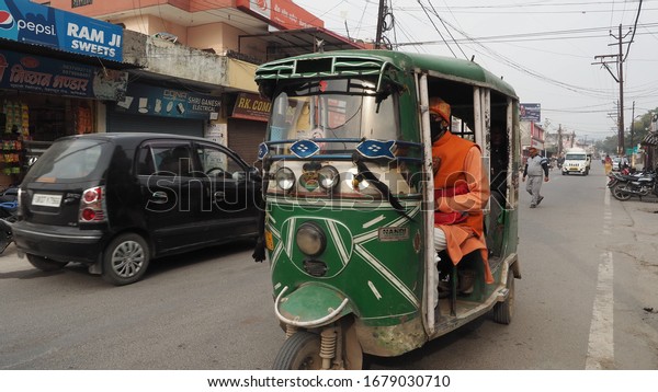 Rishikesh, Uttarakhand/India -\
02.21.2020: Messy street traffic on the street of indian\
city.