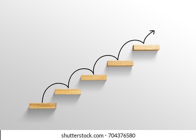 rising arrow on staircase, increasing business - Shutterstock ID 704376580