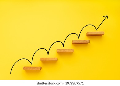 Rising Arrow On Staircase On Yellow Background. Growth, Increasing Business, Success Process Concept. Copy Space