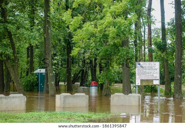 The
rising flood waters from a hurricane in the
summer.