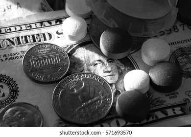 Rising Health Care Costs Are T Do Black And White. Dollars And Coins And Medical Prescription Pills.