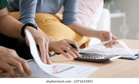 Rising high cost of living in low poor income asia people family. Past due bill debt home loan money issue young adult asian couple man woman worry shock sad tired stress in raise tax rate crisis - Powered by Shutterstock